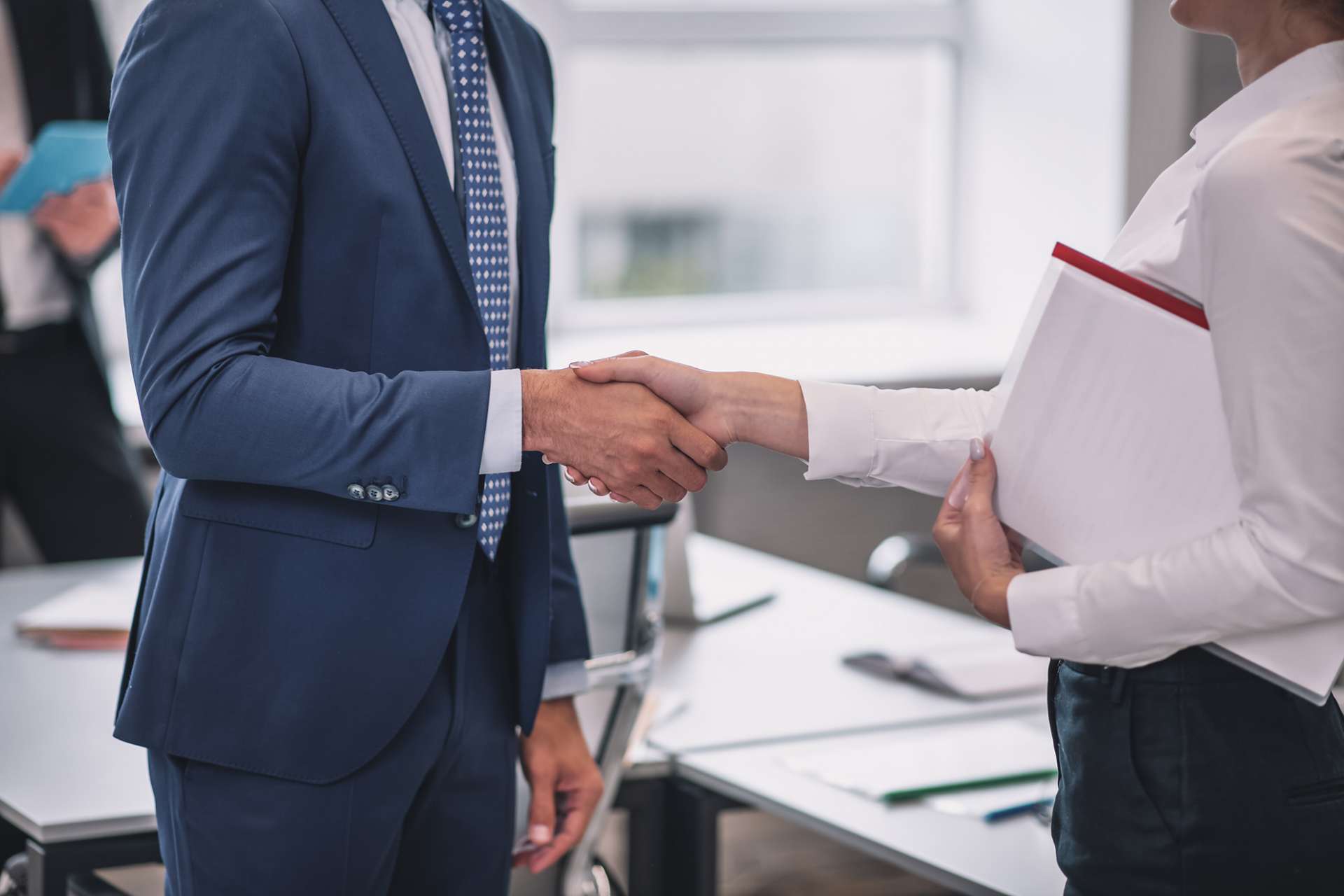 Junction Contact - Professionals shaking hands