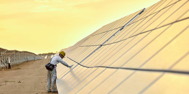 Junction Regulatory - Solar panels worker